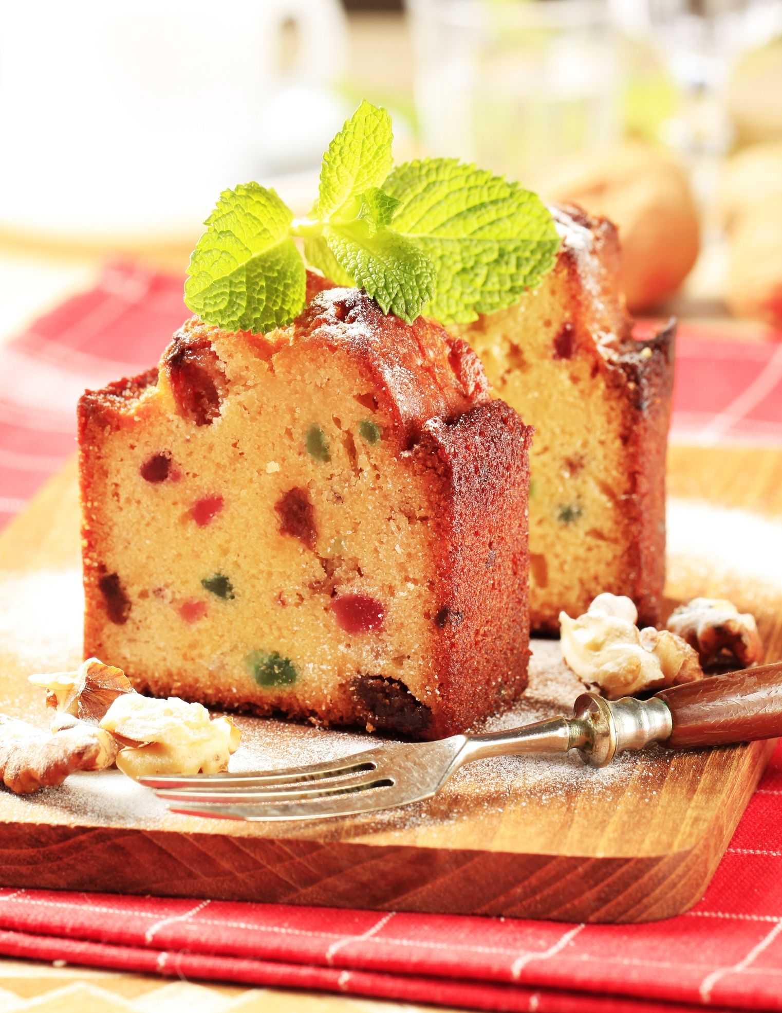 Slice of Delicious Homemade English Fruit Cake Loaf Pudding with Dried  Mixed Fruit, Sultanas, Raisin Stock Photo by ikadapurhangus